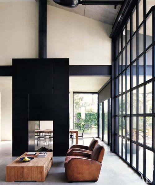 Frame a Dining Nook With a Black Fireplace Surround