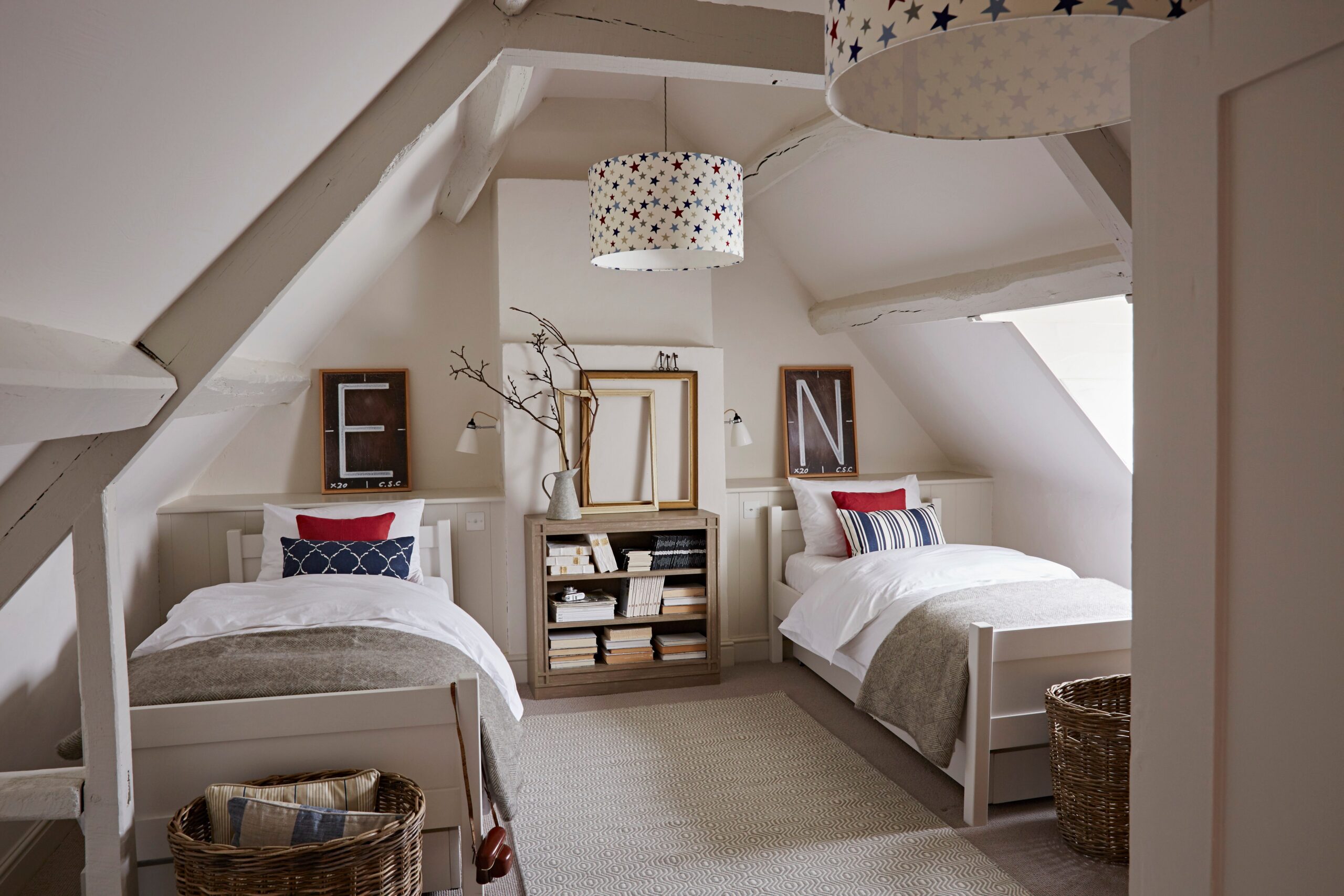 Vintage Alphabet Art Adds Graphic Interest Above Beds