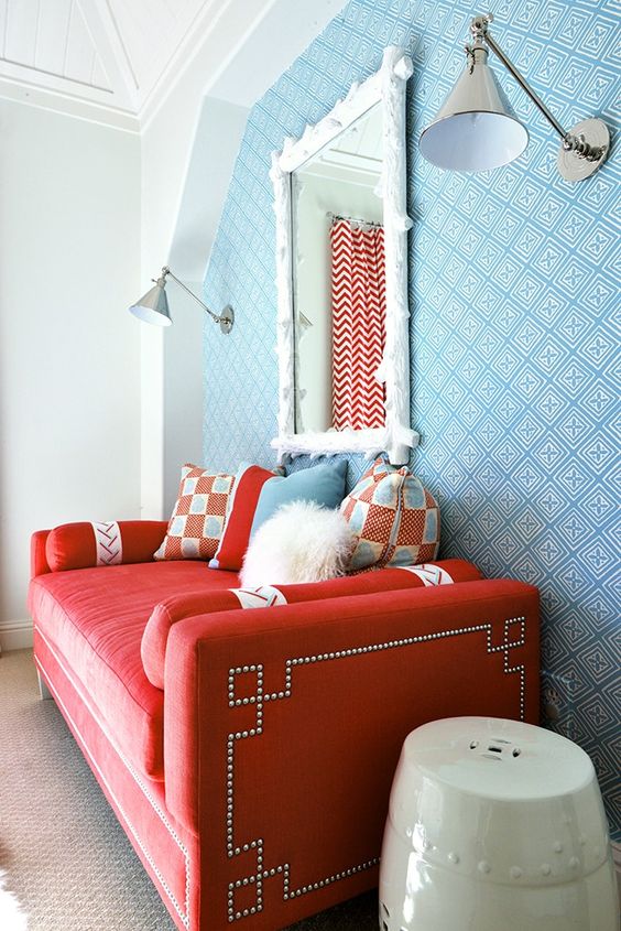 Highlight a Red Daybed With Geometric Nailhead Trim