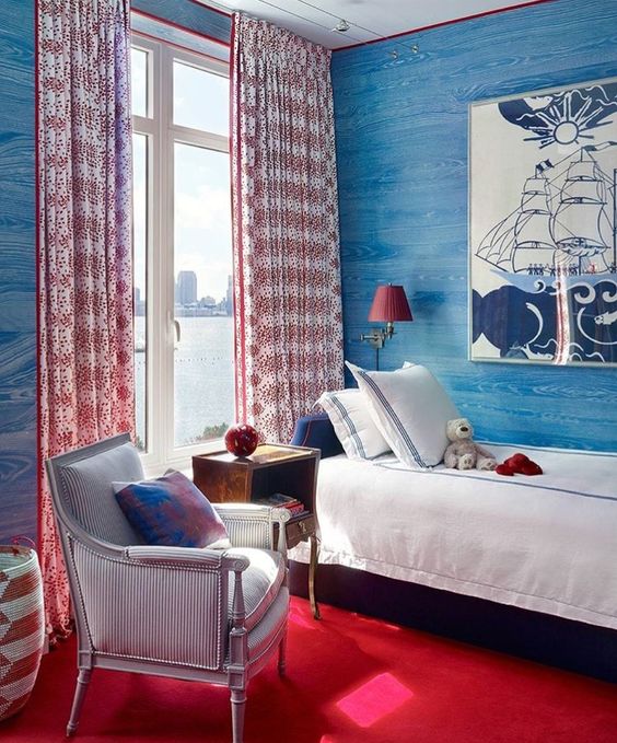 Red and White Patterned Curtains Frame a Waterfront View