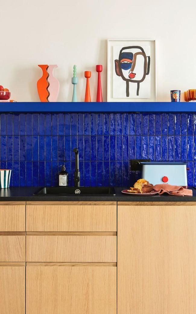 Sculptural Vases Add Artistic Flair to a Kitchen Shelf