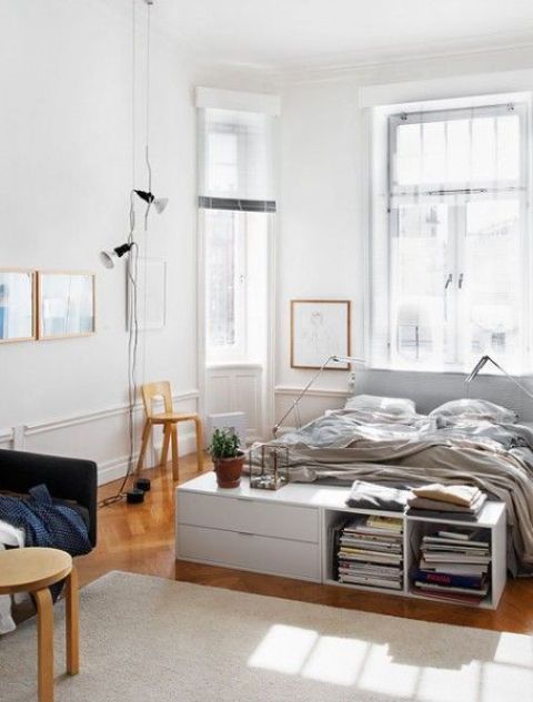 Low White Storage Unit for Books and Bedding