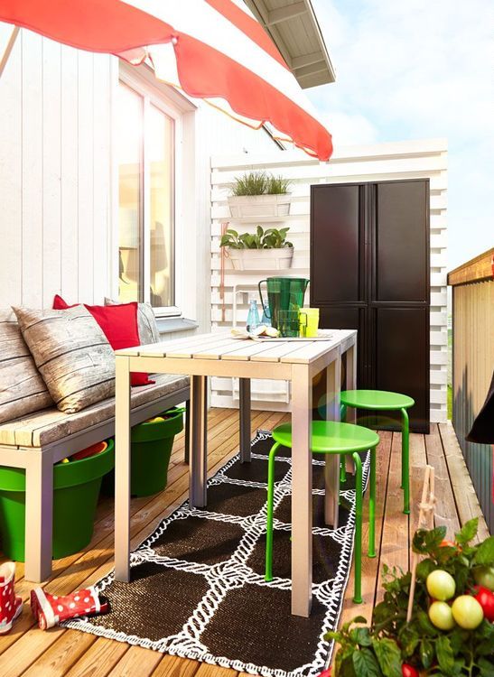 Bright Green Stools Add Pops of Color to a Neutral Balcony