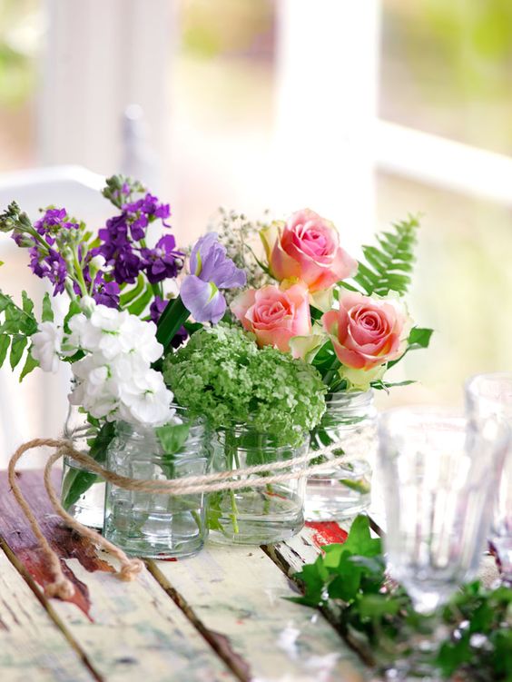 Grouped Glass Jars Tied With Twine for a Casual Centerpiece