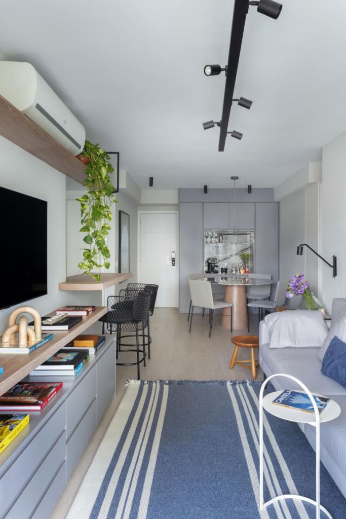 Floating Wood Shelf With Cascading Greenery Adds Life