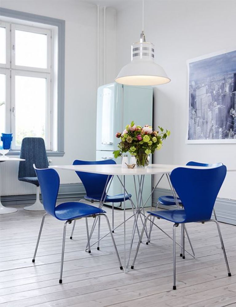Cobalt Blue Chairs Add a Modern Pop Around a White Dining Table