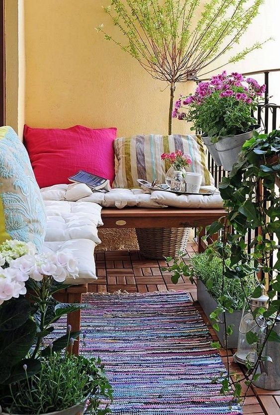 Striped Rag Rug Grounds Balcony Seating Area