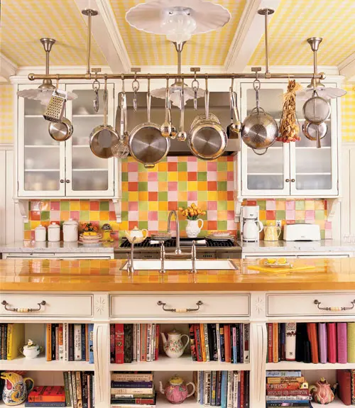 Keep Cookware Accessible Above the Stove with a Brass Pot Rack