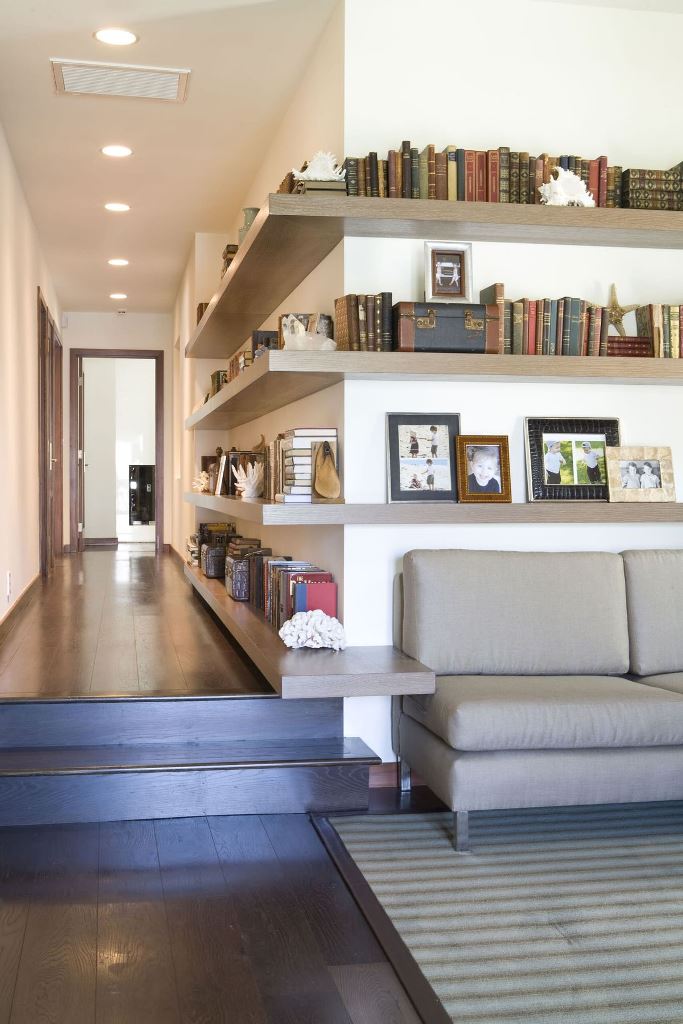 Floating Shelves That Extend Over a Sofa