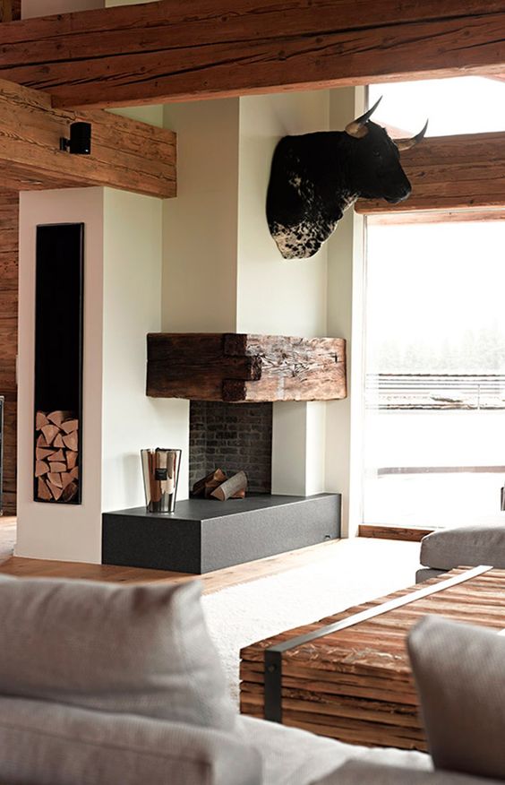 Rustic Log Wall Decor Adds Bold Statement Above Fireplace