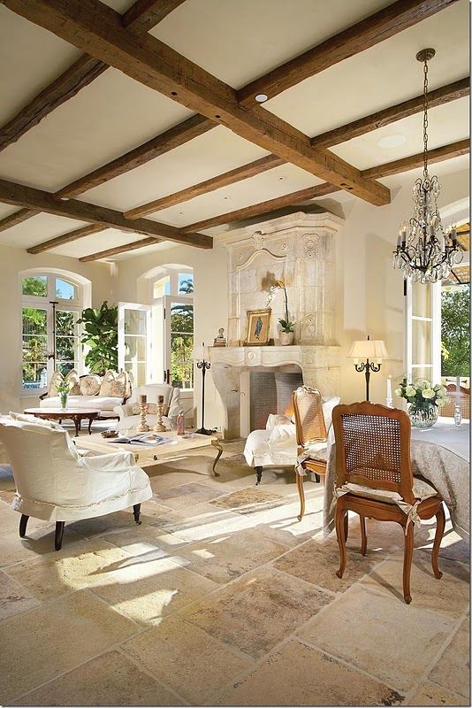 Crystal Chandelier Adds Glamour Above Exposed Beams