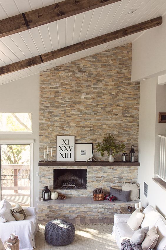 Roman Numeral Art Adds a Graphic Focal Point Above Fireplace