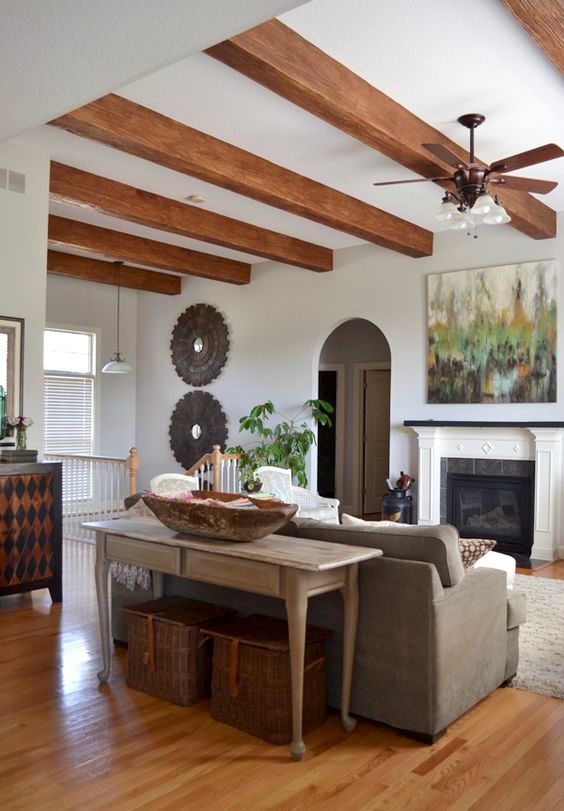 Woven Baskets Add Casual Storage Under a Console Table