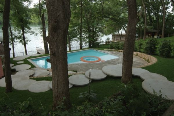Large Circular Pavers Create a Whimsical Garden Path