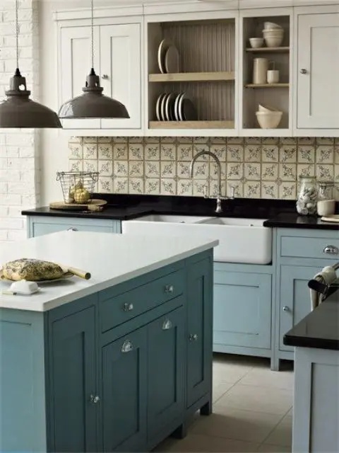 Choose Paneled Blue Cabinets with Clear Pulls for a Classic Look