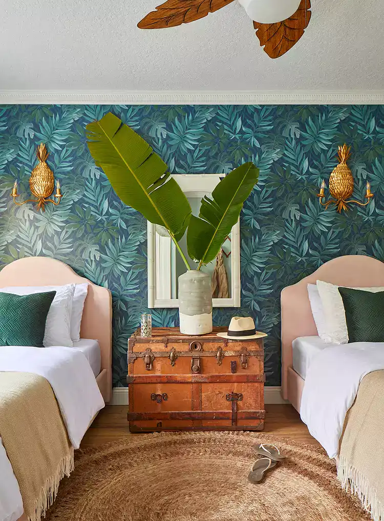 Vintage Trunk as a Bedside Table Between Twin Beds