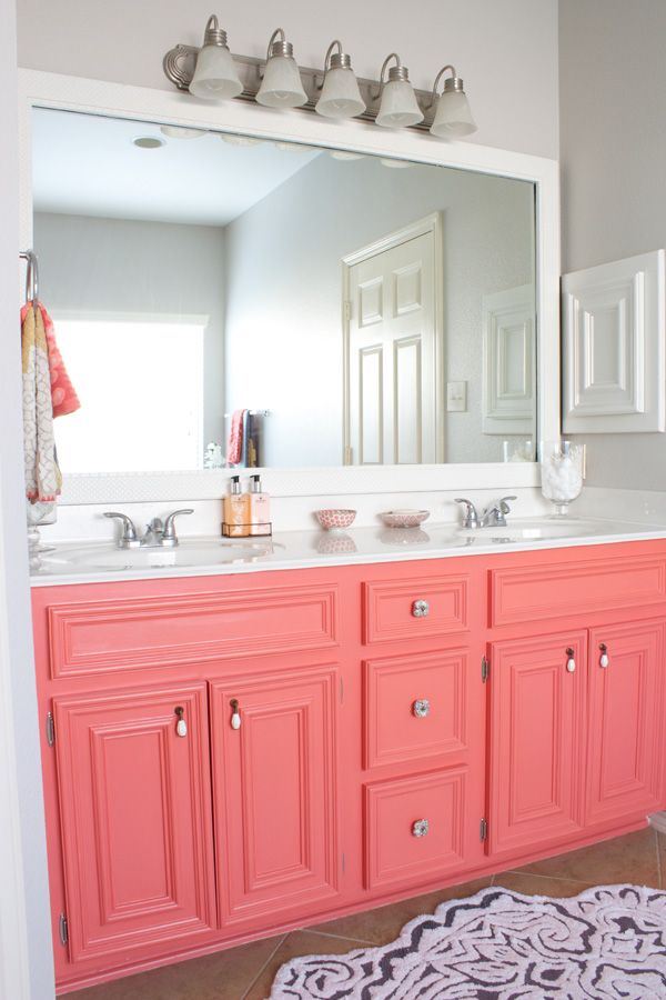 Coral Vanity Cabinets Add a Bright Pop to the Bathroom