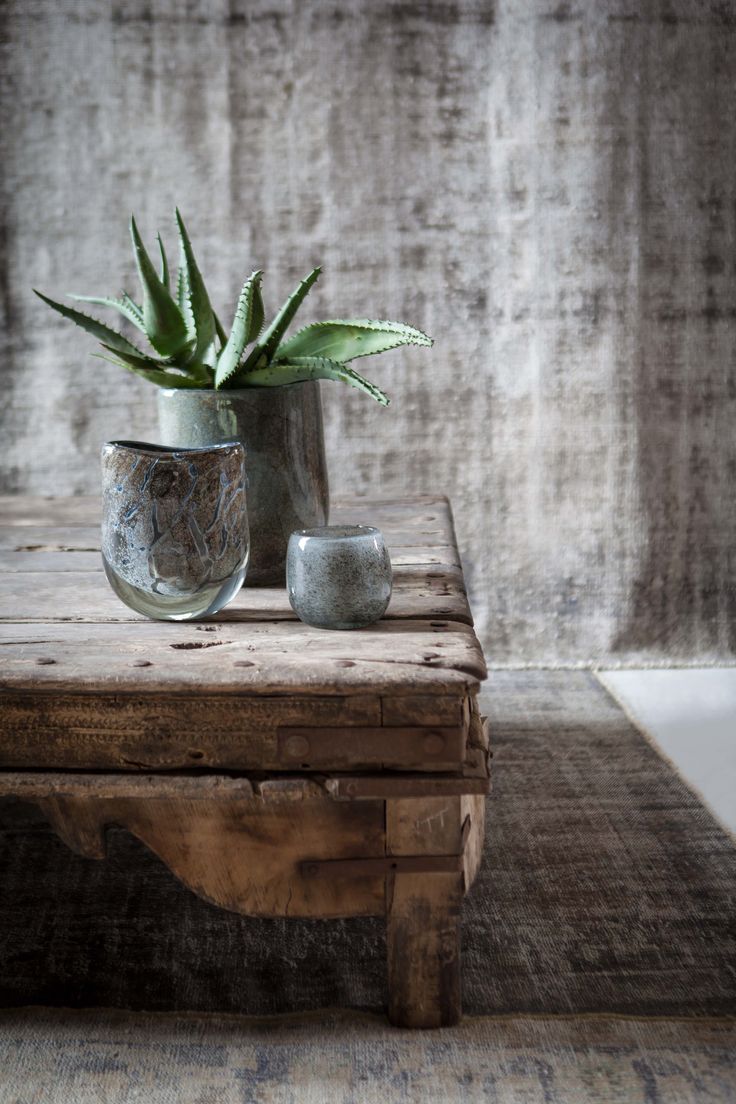 Textured Glass Vessels Add Subtle Detail to Rustic Wood