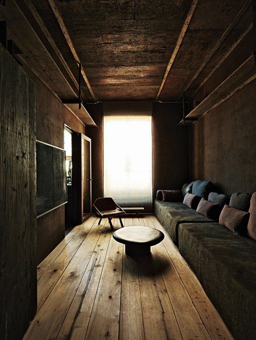 Low-Profile Round Table Anchors Simple Seating Area