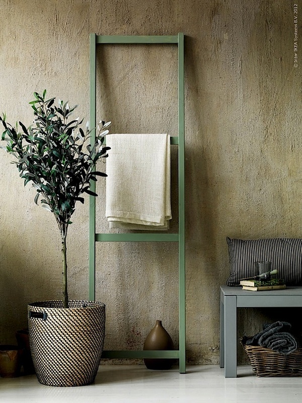 Green Ladder Shelf for Displaying Linens and Plants