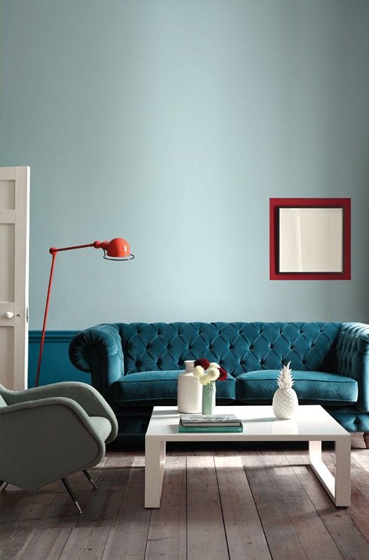 Frame a Pale Blue Wall With a Bold Red Accent