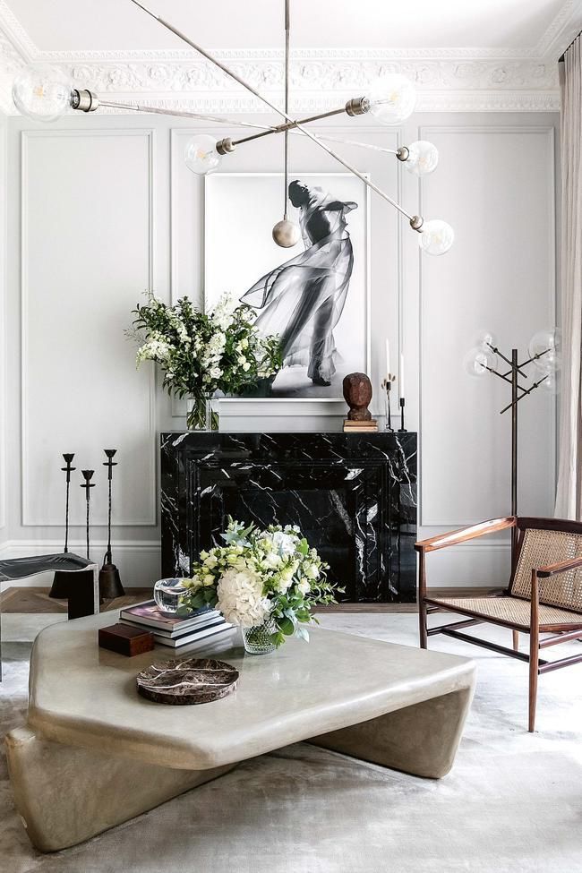 Ground Your Seating With a Sculptural Stone-Like Coffee Table