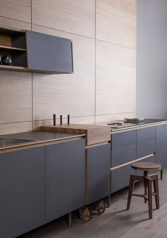 Introduce Warmth with Dark Gray Cabinets Featuring Wood Trim