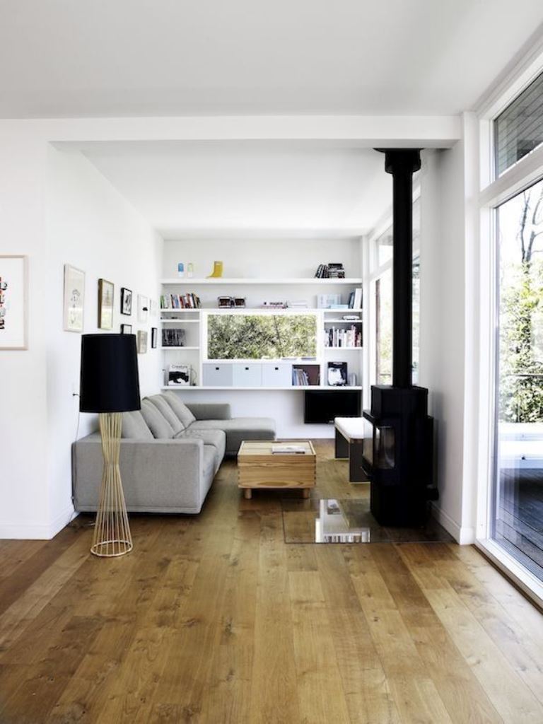 Built-In Shelving With Integrated Desk Creates a Functional Zone