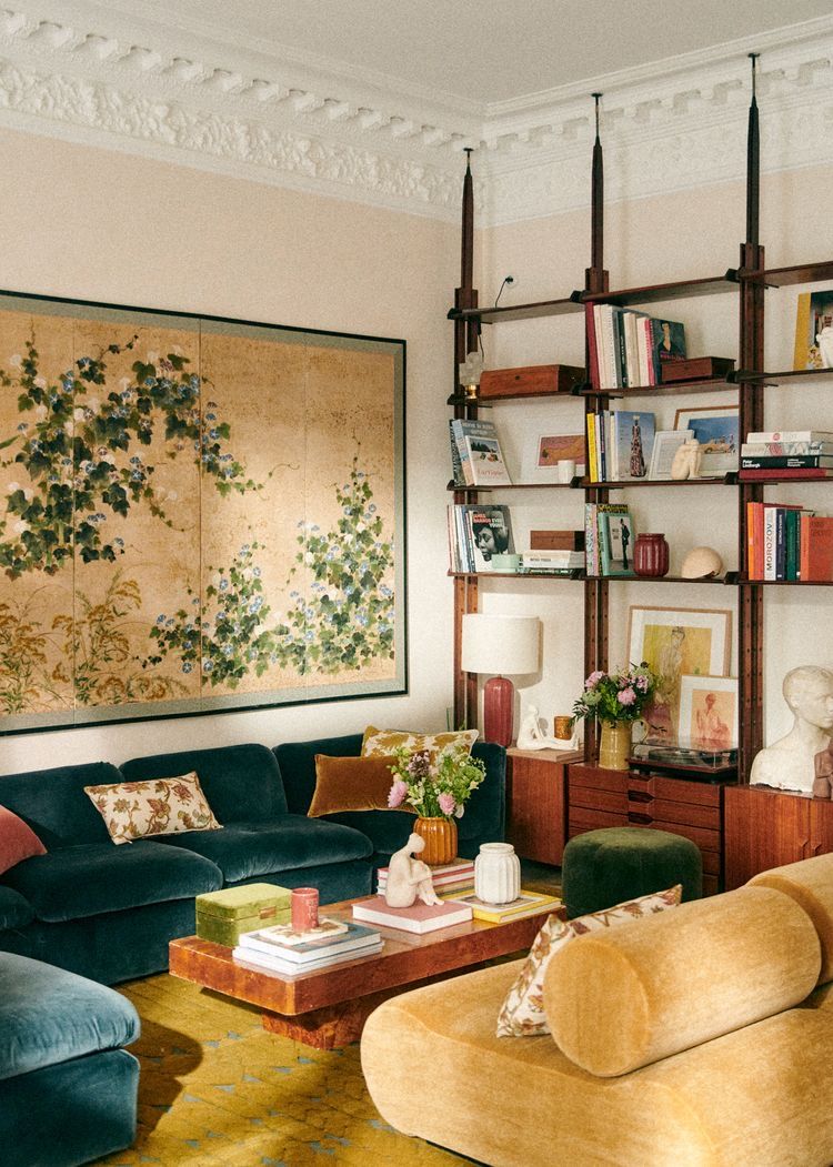 Layered Books and Decor Add Depth to Open Shelving