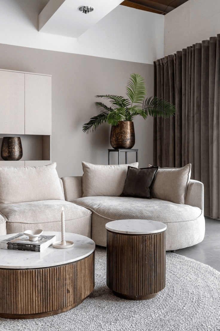 Textured Bronze Vase Holds Large Palm Fronds