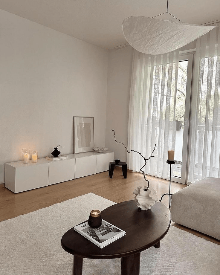 Combine a Sculptural Vase and Branch for Organic Height
