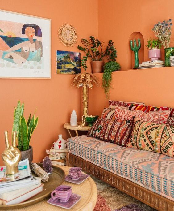 Layered Pillows Add Bohemian Texture to Wooden Sofa