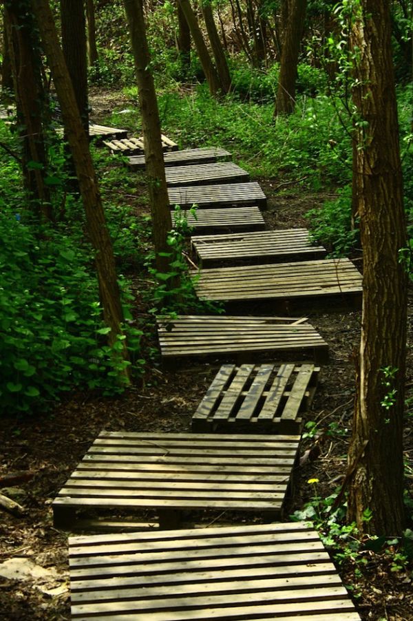 Wooden Pallet Path Creates a Rustic Woodland Trail
