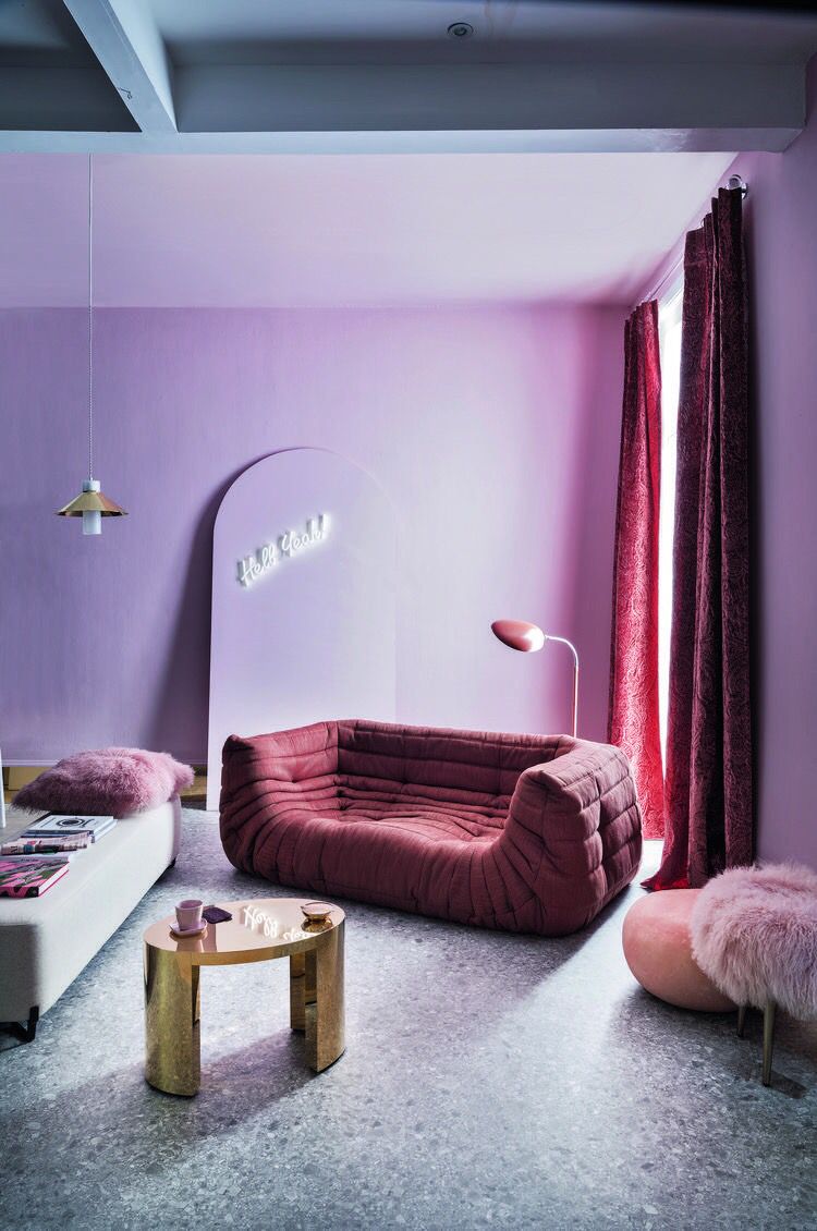 Archway with Neon Sign Adds a Playful Focal Point