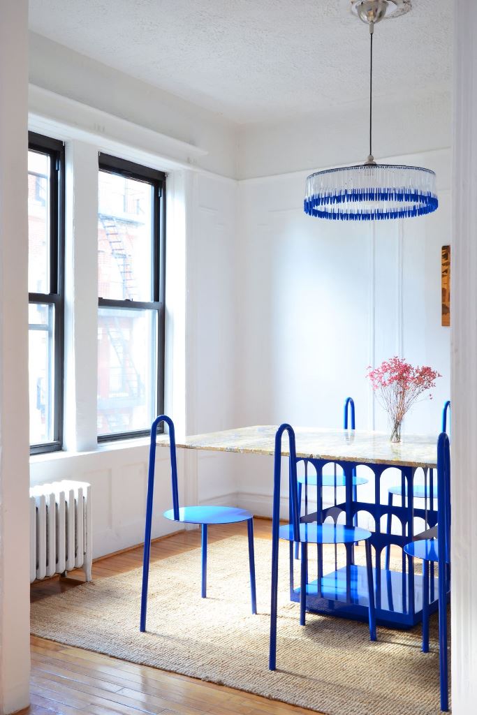 Sculptural Blue Chairs Add Playful Form to the Dining Area