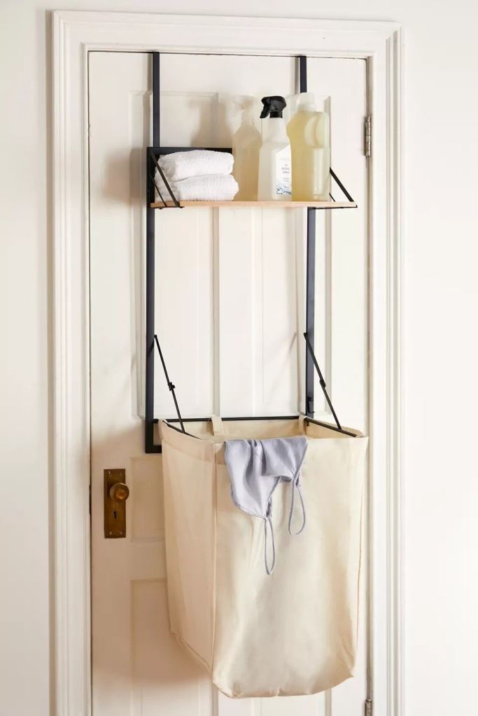Combine a Shelf and Hamper for Laundry Supplies on Your Door