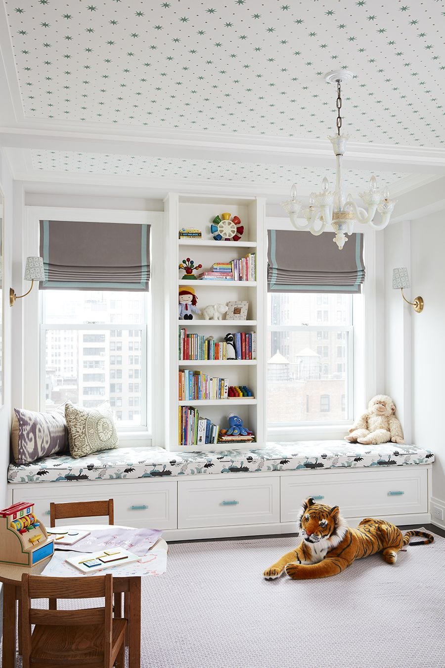 Built-in Window Seat With Storage Drawers and Bookshelves