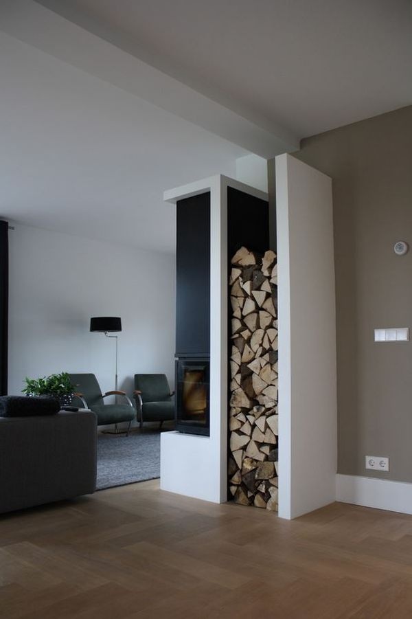 Built-In Firewood Niche Next to Modern Fireplace