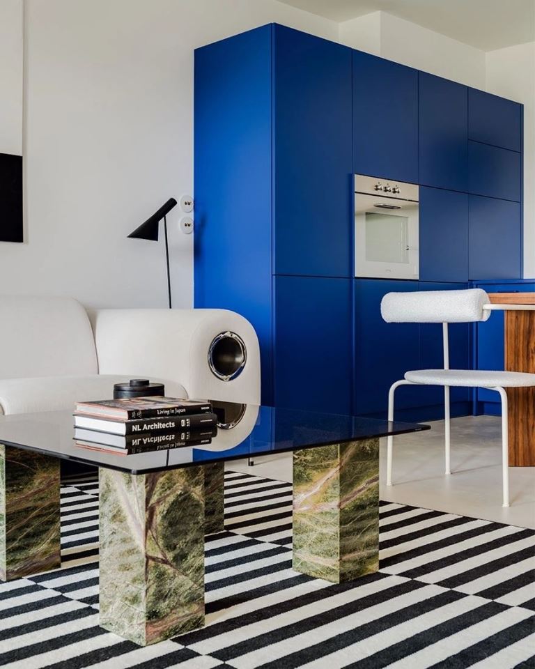 Marble Block Coffee Table Grounds a Bold Space