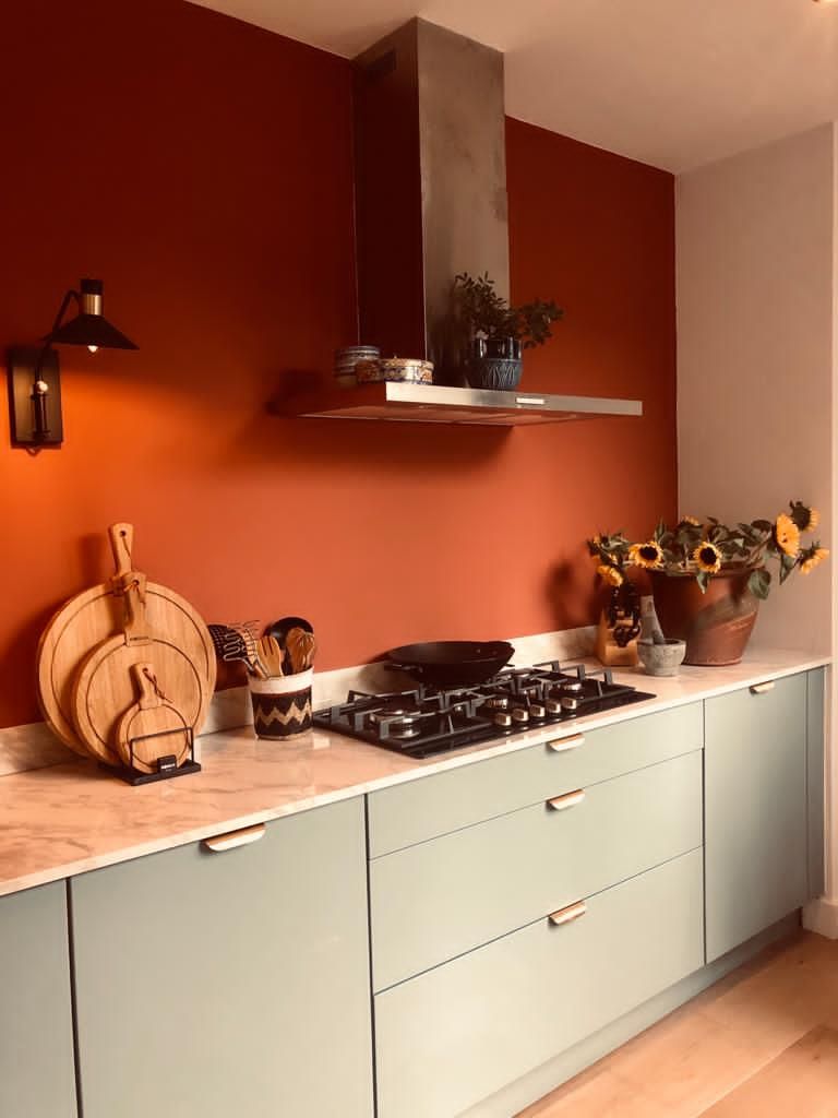 Wooden Cutting Boards Stacked on a Countertop Holder