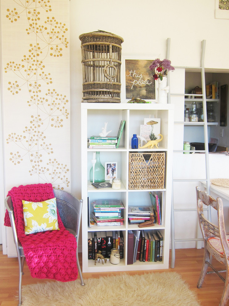 Woven Bird Cage Adds Rustic Charm To Bookshelf Top