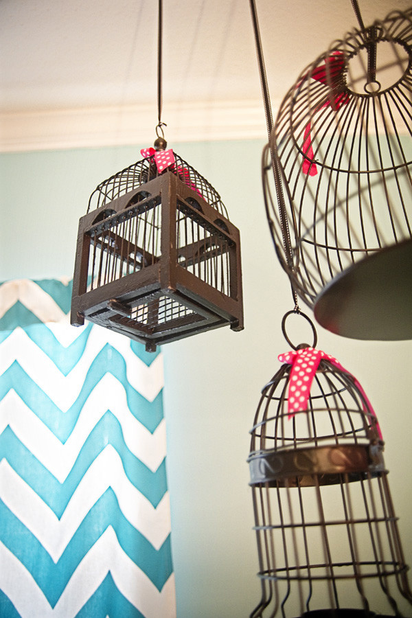 Dark Bird Cages Adorned With Pink Polka Dot Ribbon