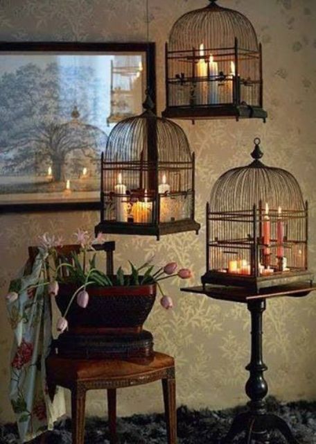 Hanging Bird Cages Filled With Candles Create Ambient Light