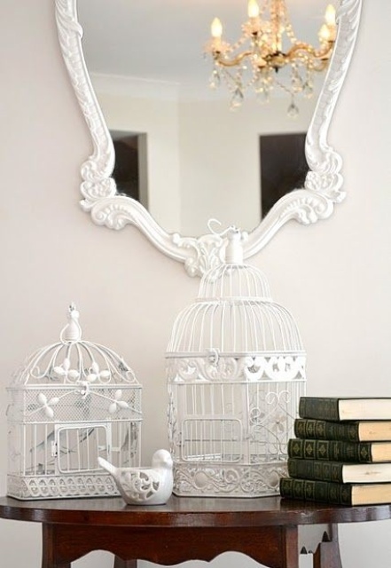 Pair White Bird Cages with Stacked Vintage Books