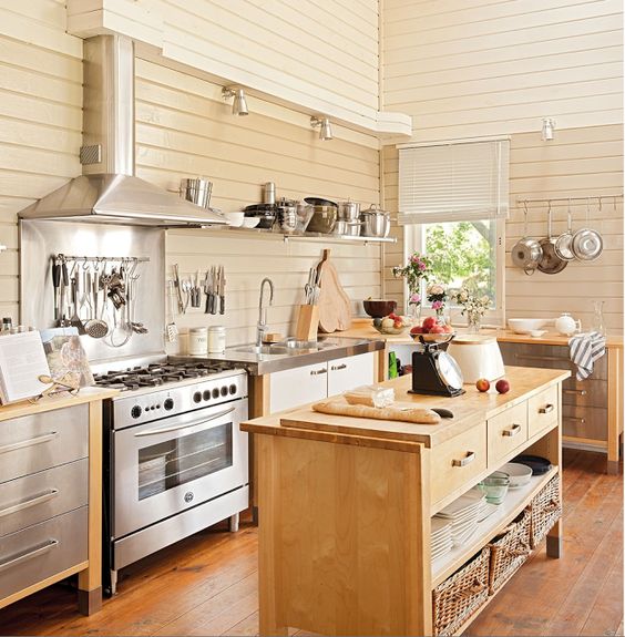 Light Wood Island With Woven Baskets For Storing Plates