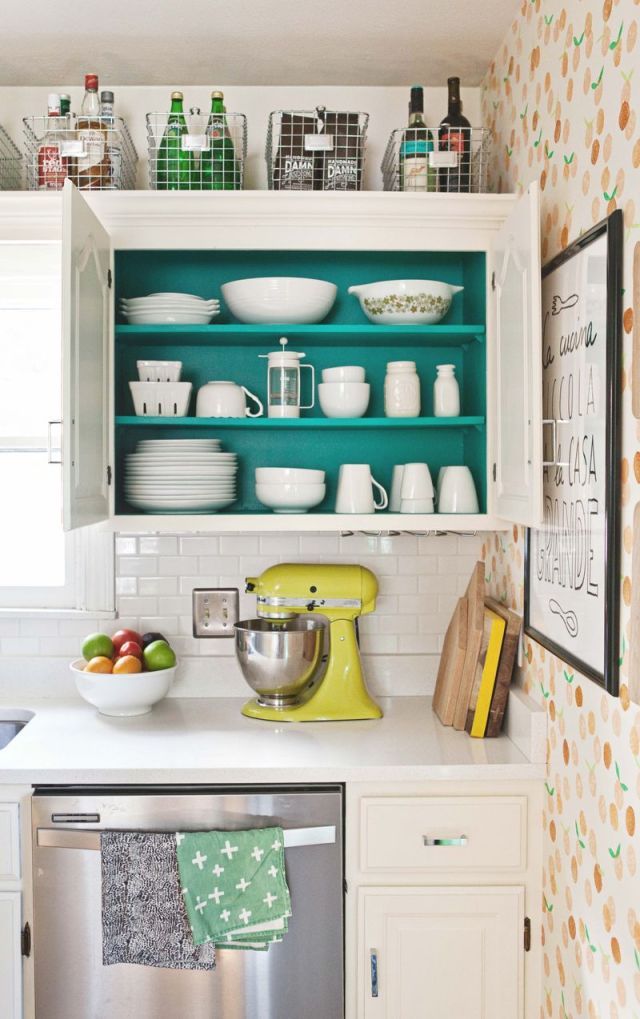 Paint Cabinet Interiors Teal to Highlight Dishes