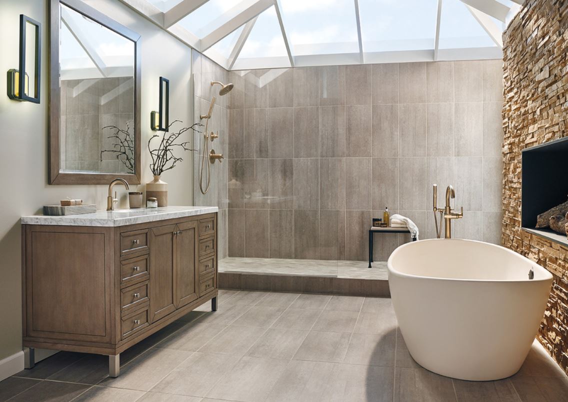 Freestanding Tub With Stone Fireplace Creates a Cozy Focal Point