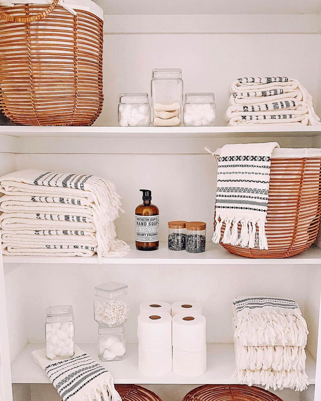 Shelving With Organizational Straw Baskets