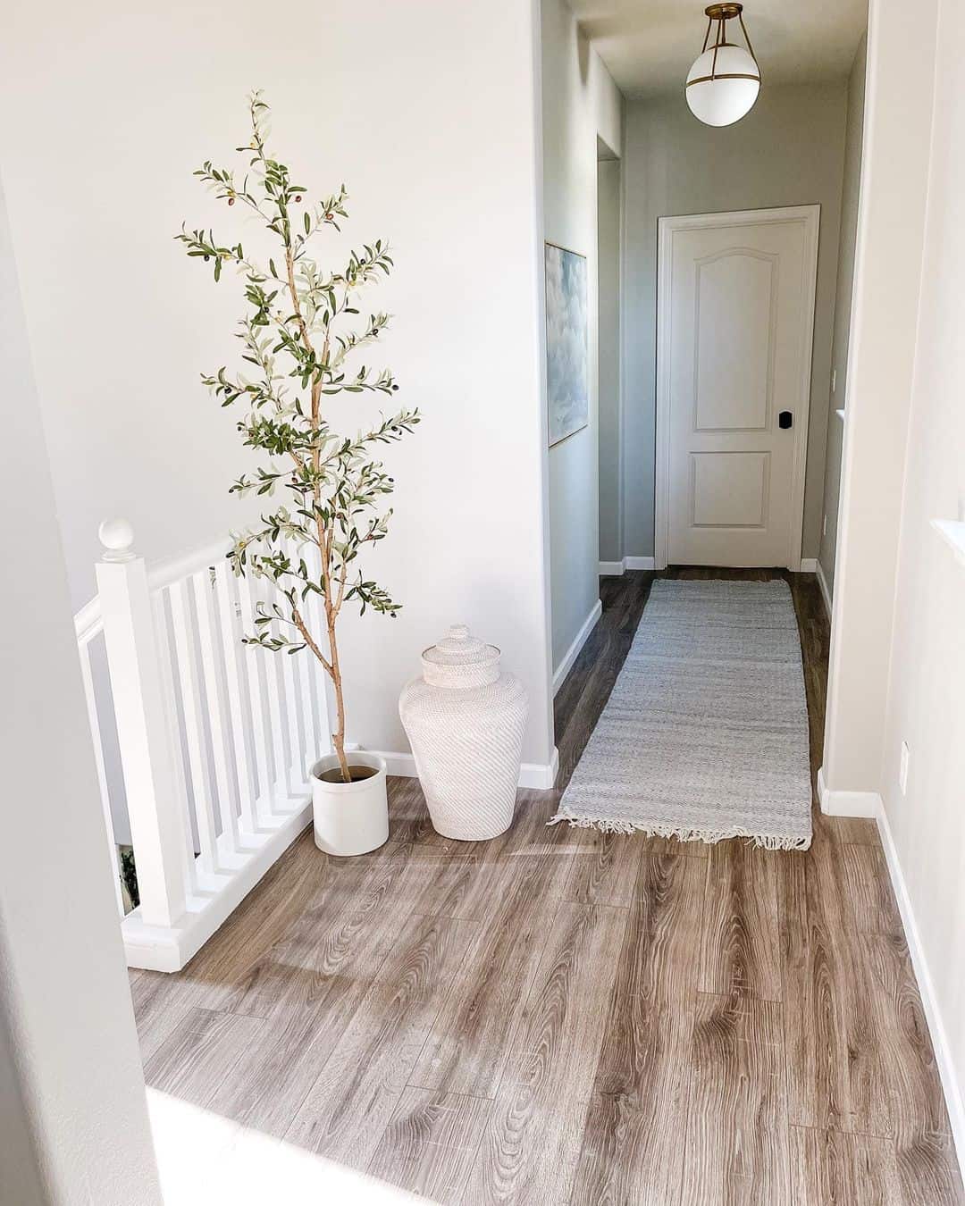 Fake Olive Tree at Top of Staircase