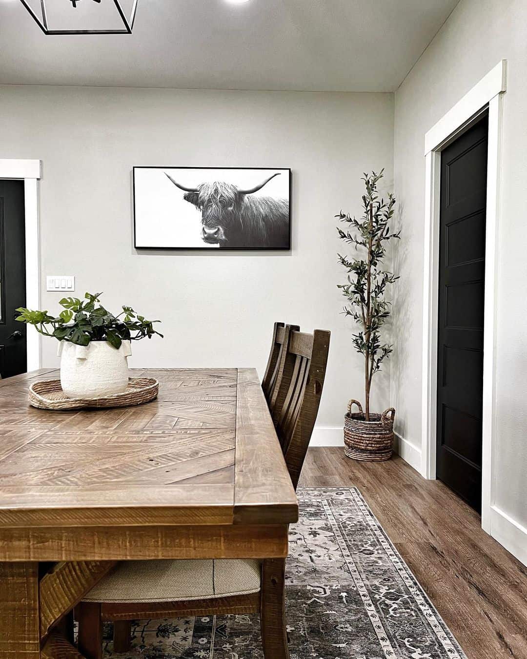 Patterned Rug Beneath Solid Wood Table